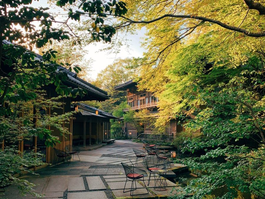 HOSHINOYA Kyoto - the garden courtyard of the Arashiyama estate, reached by boat